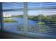 Window view overlooking tranquil water and lush greenery at 6315 Shoreline Dr # 3208, St Petersburg, FL 33708