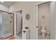 Well-lit bathroom with a glass-enclosed shower and a separate toilet room for added convenience at 6449 Mooring Line Cir, Apollo Beach, FL 33572