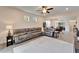 Comfortable living room featuring a large sectional sofa and contemporary decor at 6449 Mooring Line Cir, Apollo Beach, FL 33572