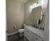 Updated bathroom with vanity and marble countertop at 8222 Brent St, Port Richey, FL 34668