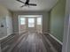 Spacious bedroom with bay window and wood floors at 8222 Brent St, Port Richey, FL 34668