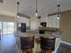 Modern kitchen with white cabinets and granite countertops at 8222 Brent St, Port Richey, FL 34668
