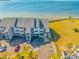 Condo building's aerial view showcasing waterfront access at 828 Bahia Del Sol Dr # 59/ A, Ruskin, FL 33570