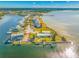 Aerial view of waterfront property with boat docks at 828 Bahia Del Sol Dr # 59/ A, Ruskin, FL 33570