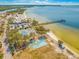 Aerial view of waterfront community with tennis courts and beach access at 828 Bahia Del Sol Dr # 59/ A, Ruskin, FL 33570