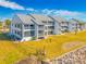 Aerial view of condo building and waterfront at 828 Bahia Del Sol Dr # 59/ A, Ruskin, FL 33570