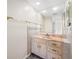 Bathroom features a pink vanity top and tiled walls at 828 Bahia Del Sol Dr # 59/ A, Ruskin, FL 33570