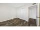 Spacious bedroom with double door closets and wood-look tile floors at 828 Bahia Del Sol Dr # 59/ A, Ruskin, FL 33570