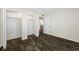 Bedroom with wood-look floors and double closets at 828 Bahia Del Sol Dr # 59/ A, Ruskin, FL 33570