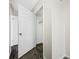 White closet with wood flooring and additional storage at 828 Bahia Del Sol Dr # 59/ A, Ruskin, FL 33570