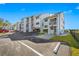 Condo building's exterior with parking and ocean views at 828 Bahia Del Sol Dr # 59/ A, Ruskin, FL 33570