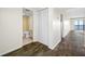 Interior hallway with tile flooring, linen closet, and bathroom access at 828 Bahia Del Sol Dr # 59/ A, Ruskin, FL 33570