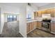 Bright kitchen with stainless steel appliances and ocean views at 828 Bahia Del Sol Dr # 59/ A, Ruskin, FL 33570