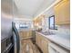 Kitchen with stainless steel appliances and ocean views at 828 Bahia Del Sol Dr # 59/ A, Ruskin, FL 33570