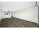 Spacious living room with tile floors and access to kitchen and hallway at 828 Bahia Del Sol Dr # 59/ A, Ruskin, FL 33570