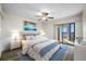 Main bedroom with ocean view and access to balcony at 828 Bahia Del Sol Dr # 59/ A, Ruskin, FL 33570