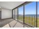 Sunroom with water views and sliding glass doors at 828 Bahia Del Sol Dr # 59/ A, Ruskin, FL 33570
