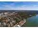 Aerial view of a single Gathering home in a residential neighborhood near the water at 8349 41St N Ave, St Petersburg, FL 33709