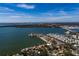 An aerial view of a waterfront home with a beautiful view of the water and surrounding area at 8349 41St N Ave, St Petersburg, FL 33709