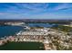 Aerial view of a waterfront home with a beautiful view of the water and surrounding area at 8349 41St N Ave, St Petersburg, FL 33709