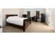 Bright bedroom with double bed, workspace, and ample closet space at 9111 Moonlit Meadows Loop, Riverview, FL 33578