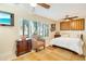 Spacious bedroom with king-size bed and large windows at 103 Rodgers Ne Ave, Port Charlotte, FL 33952