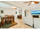 Bright dining area with wood table and chairs, near living room at 103 Rodgers Ne Ave, Port Charlotte, FL 33952