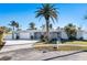 House exterior with attached garage and mature landscaping at 103 Rodgers Ne Ave, Port Charlotte, FL 33952