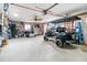 Garage features golf cart, storage cabinets, and workshop at 103 Rodgers Ne Ave, Port Charlotte, FL 33952