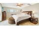 Spacious Primary bedroom with king-size bed and water view at 103 Rodgers Ne Ave, Port Charlotte, FL 33952