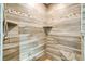 Walk-in shower with modern tile and built-in shelving at 103 Rodgers Ne Ave, Port Charlotte, FL 33952