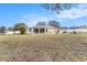 Large backyard with spacious grassy area at 10442 Bloomfield Hills Dr, Seffner, FL 33584