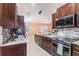 Kitchen with stainless steel appliances and granite countertops at 10442 Bloomfield Hills Dr, Seffner, FL 33584