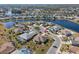 Aerial view of home, neighborhood, and lake at 1311 Caloosa Lake Ct, Sun City Center, FL 33573