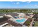 Resort-style community pool with surrounding amenities at 1311 Caloosa Lake Ct, Sun City Center, FL 33573