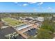 Aerial view of community pool and grounds at 1311 Caloosa Lake Ct, Sun City Center, FL 33573