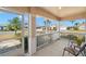 Screened porch with seating area, overlooking the neighborhood at 1311 Caloosa Lake Ct, Sun City Center, FL 33573