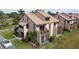 Aerial view of a townhome community with golf course views at 1326 Pelican Creek Xing # D, Gulfport, FL 33707