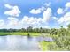 Property with pond and golf course views at 1326 Pelican Creek Xing # D, Gulfport, FL 33707