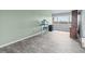 Loft area with gray walls and floors at 1326 Pelican Creek Xing # D, Gulfport, FL 33707