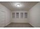 Spacious bedroom with hardwood floors and window blinds at 1404 W Granfield Ave, Plant City, FL 33563