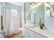 Bathroom featuring a vanity, toilet, and bathtub with shower at 15110 Shearcrest Dr, Lithia, FL 33547