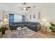 Spacious living room featuring a sectional sofa and wood-look floors at 1534 Ridge Shore Dr, Tarpon Springs, FL 34689