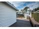 View of the backyard from the deck, featuring a storage shed at 1570 S Michigan Ave, Clearwater, FL 33756