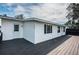 A view of a beautiful home with a spacious deck, perfect for outdoor entertaining and relaxation at 1570 S Michigan Ave, Clearwater, FL 33756