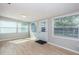 Bright living room with wood floors and multiple windows at 1570 S Michigan Ave, Clearwater, FL 33756