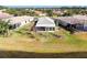 Aerial view of house and surrounding neighborhood at 15856 Cobble Mill Dr, Wimauma, FL 33598