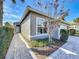 Home exterior showcasing a walkway leading to the front entrance at 15856 Cobble Mill Dr, Wimauma, FL 33598