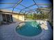 Screened pool and spa with lounge chairs at 16103 Muirfield Dr, Odessa, FL 33556