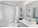 Clean bathroom with white subway tile and quartz vanity at 16317 Gulf Blvd, Redington Beach, FL 33708